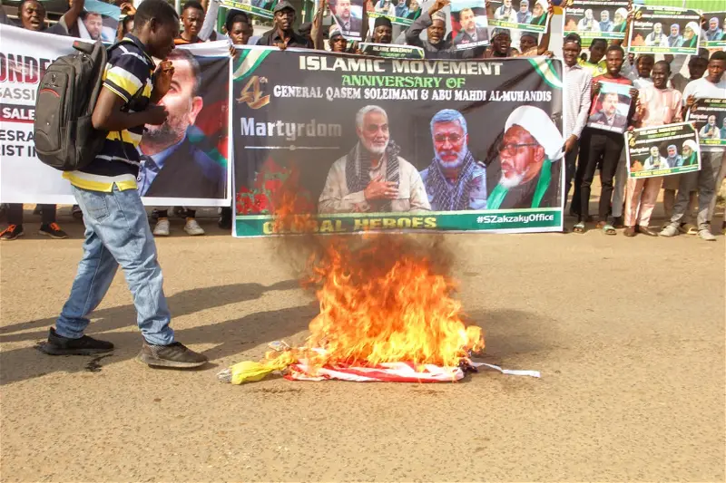 Shiite members burn Israel and US flag in Abuja