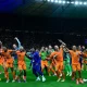 Netherlands players celebrate after the UEFA Euro 2024 quarter-final