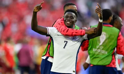 Nigeria's Saka celebrates England win over Switzerland